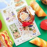 🍓🐇 Bunnies, birds, and strawberries—oh my! @hwainio’s adorable friends are gathering the juiciest berries, then turning them into the dreamiest desserts. From towering cakes and dainty tea treats to garden picnics, it’s definitely a berry good time to be had!

Art by: @hwainio

Top Coating: None
Adhesive Layer: Paper
Backing Layer: Clear PET
6.69" x 3.54".
Weight - 0.03lbs.
1 sheet included&nbsp;