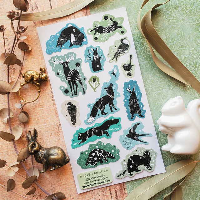 STICKII Tales of the Wild Sticker Sheet

🐾🦌 Winter settles over the wild in&nbsp;@nadievanwijk’s magical set, where foxes howl beneath starry skies, hares leap through frost-covered ferns, and birds glide through crisp, quiet air.