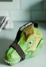 Keep your snacks safe from extinction with this fierce T-Rex head lunchbox. Made from durable polypropylene with a secure silicone lining and a sturdy fabric carry handle, it’s tough enough for any Jurassic adventure. Big enough for sandwiches, fruit, and treats — or for storing toys, crayons, or fossils — this versatile case is perfect for school, play, or travel.
