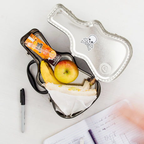 Lunch just got loud. This guitar-shaped tin lunchbox brings rock-n-roll attitude to school, work, or picnics. Keep sandwiches and snacks secure with a sturdy latch and carry handle, then personalise your case with the included set of stickers – just like a real tour pro. Made from durable, food-grade tin and designed to last, it’s the coolest way to carry your lunch on the road.