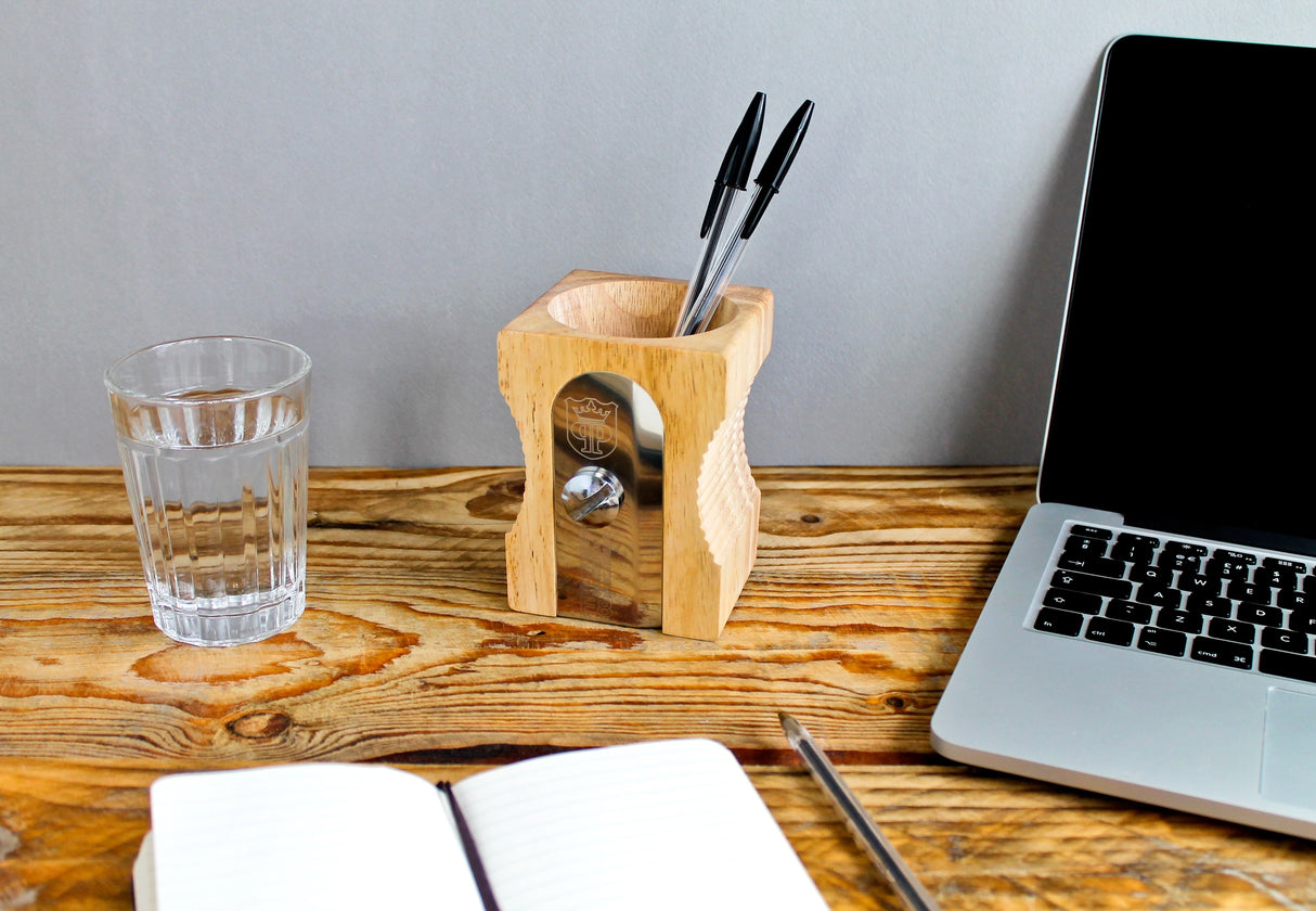 Giant pencil sharpener stationary organizer and pen pot/holder - perfect for organizing your desk at the office, in the classroom or at home. This smart and original product design keeps desks in prime working condition.

Made from extra-strong material: sustainable Rubber wood and silver stainless steel, it’s an elegant and classic design that is instantly recognizable.