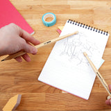 SUCK UK Drumstick Pencils

Some ideas arrive quietly. Others arrive in the middle of a drum break. Whether you're composing a rock-balled or just avoiding maths homework, drumstick pencils are always ready for an impromptu drum solo on the rim of your mug. Tap your way through the day with a pair of drumsticks that occasionally double as pencils. An ideal gift for fidgety creative thinkers.

Pair of pencils shaped like drumsticks.
Made from responsibly sourced wood.
Quiet alternative to a full-size drum kit