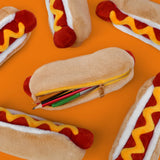 Store stationery or other small items 
Plush hot dog shaped case with gold zip. Store your belongings in style by filling your hot dog bun full. Yum!

Plush Zip Pouches designed and made by SuckUK
Juicy, tasty, sweet and sour. And very cute. Stuff your stuff into something soft, and squishy. Delicious looking plush zip pouches look like foodie treats but instead of calories, they hold your everyday essentials. From cheesy slices to sickly treats, each pouch is designed to be irresistible and practical. Perf