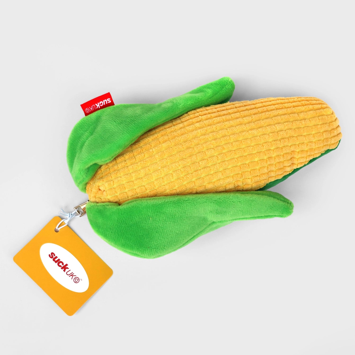 SUCK UK Plush Pouch - Sweetcorn

Plush corn on the cob shaped case with gold zip. Store your belongings in style by filling your corn full. Butter wouldn't melt!

Juicy, tasty, sweet and sour. And very cute. Stuff your stuff into something soft, and squishy. Delicious looking plush zip pouches look like foodie treats but instead of calories, they hold your everyday essentials. Perfect for pens, cables, cosmetics, or whatever bits and bobs you need to stash on the go. Soft-touch plush exterior. Secure zip cl