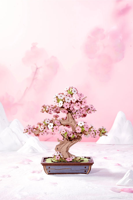 Bring the serene beauty of nature into your home with this captivating DIY 3D wooden puzzle kit, featuring a delicate cherry blossom bonsai tree. This enchanting puzzle lets you craft a stunning, intricate tree adorned with blooming cherry blossoms, all from precision-cut wooden pieces that fit together seamlessly. Perfect for displaying in your home or office, this elegant puzzle serves as a reminder of the peaceful beauty of cherry blossoms in bloom.
