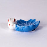 These cute ceramic rests are a perfect stationery addition to your desk! Use them for pens, paint brushes, or take them to your kitchen as a chopstick rest!

Size: 2.5"L
Material: Porcelain
Weight: 1.6 oz
Origin: China