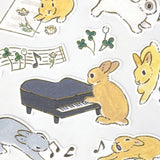 Schinako Moriyama Rabbits and Music Sticker Sheet

A sticker sheet with gold outlines featuring rabbits playing various instruments to showcase musical talents is here to add both adorable and elegant touches to your journal pages ♪
