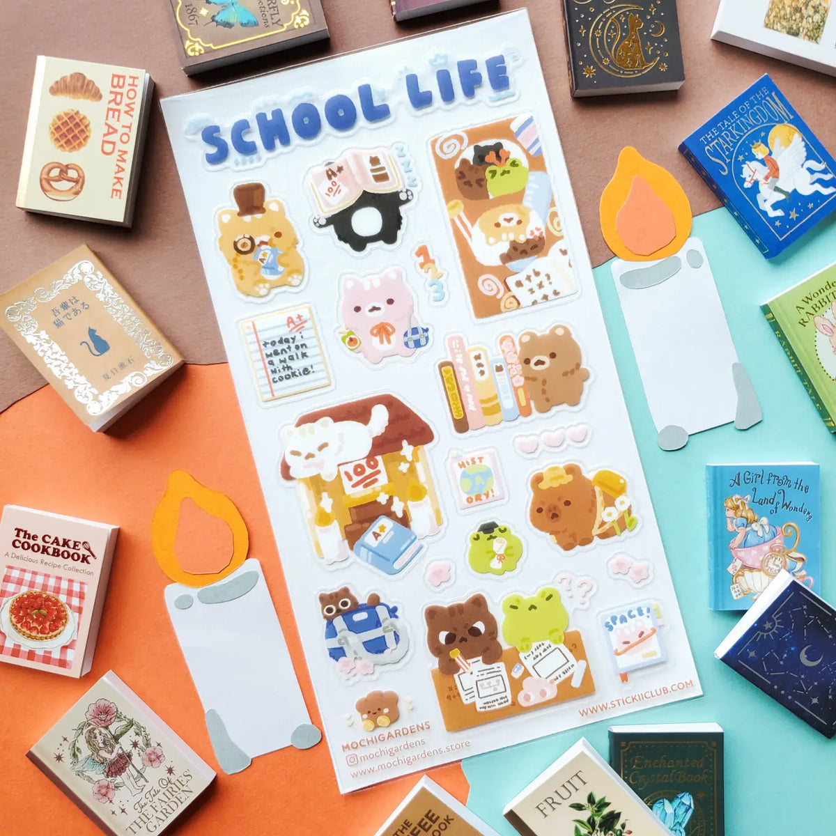 ✏️📖 School is in session, and @mochigardens’ adorable little students are doing their very best… mostly! From acing tests and hauling backpacks to sneaking snacks, falling asleep on textbooks, and tackling some seriously confusing homework, these studious critters know that school life is a mix of hard work and tiny treats. Art by: @mochigardens

Top Coating: None
Adhesive Layer: PVC (plastic)
Backing Layer: Clear PET
6.69" x 3.54".
Weight - 0.03lbs
1 sheet included