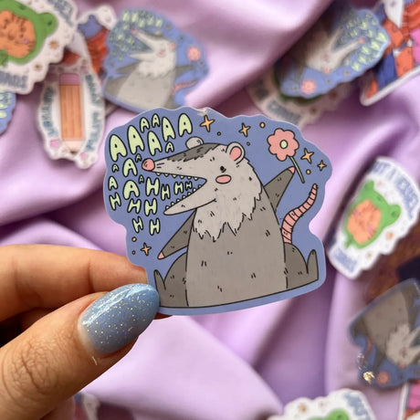 Screaming Opossum Vinyl Sticker

Aaaaaaaaaaaahhhhhh. What else is there to say? The sticker is made of high-quality vinyl and is weatherproof, so it can be used on any surface.

2.5inch Waterproof Sticker