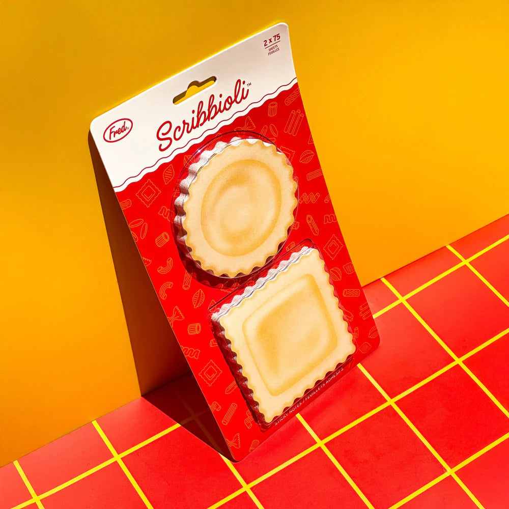 Pasta-bly the cutest sticky notes ever.

Stick a fork in your to-do list—Fred’s Scribbioli is served! These ravioli-shaped sticky notes are stuffed with charm and perfect for bite-sized reminders or saucy little love notes. Each set includes two pads with 75 sheets each and comes packed in a gift-ready backer card.