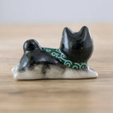 These cute ceramic rests are a perfect stationery addition to your desk! Use them for pens, paint brushes, or take them to your kitchen as a chopstick rest!

Size:2"L
Material: Porcelain
Weight: 1.6 oz
Origin: China