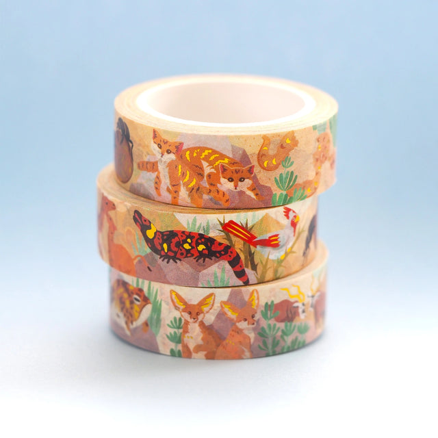 Don't leave your washi collection high and dry! Treat yourself with this desert washi tape, featuring 11 desert-dwelling species: fennec fox, gemsbok, dromedary camel, gila monster, desert cardinal, dung beetle, sand cat, sand viper, thorny devil lizard, jerboa, and desert rain frog.