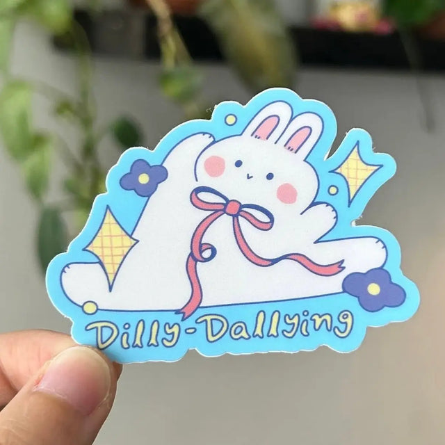 Dilly dally all day long.

Dishwasher safe
Size: 2.8” x 2.1"
Soft matte vinyl