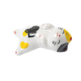 These cute ceramic rests are a perfect stationery addition to your desk! Use them for pens, paint brushes, or take them to your kitchen as a chopstick rest!

Size: 2"
Material: Ceramic
Weight:1.6 oz (45.36 g)
Origin: China