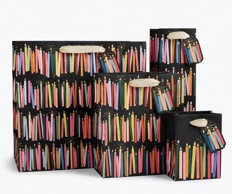 Giving gets even more special with our gift bags, which feature charming extras like gold foil accents, cotton ribbon handles, and a coordinating “To” and “From” tag.
