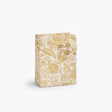 Giving gets even more special with our gift bags, which feature charming extras like gold foil accents, cotton ribbon handles, and a coordinating “To” and “From” tag.

Small: 6 x 4.5 x 0.3 in
Coated paper with cotton ribbon handles
Printed in full color and UV gold glitter
Gold lurex ribbon handles
Cardboard floor insert