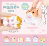 These adorable hamsters are made of soft vinyl (sofubi). Approximately 5.5cm tall.

Lineup (6 Variants):

Munching (Djungarian Hamster)
Murmuring (Golden Hamster)
Sleeping (Golden Hamster)
Sniffing (Pearl White Hamster)
Sniffing (Blue Sapphire Hamster)
Lying Down (Pudding Hamster)