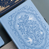 Archer and Olive A5 Notebook: Songbird in Blue Dot Grid