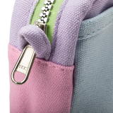 A compact carry-all pouch for artists, makers, and stationary lovers who appreciate a little order in their chaos. Structured enough to hold its form, soft enough to fit anywhere, and fully machine-washable for the days that get a little messy — your tools, pens, and creative essentials stay safe, visible, and ready wherever you go.

Inside, 20 pockets make space for art supplies, stationary essentials, and an A5 notebook, all secured by a smooth YKK zipper. Sized to fit within larger bags or carry on its o