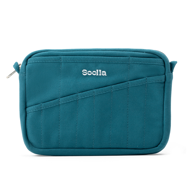 Front layout: 8 slanted pockets + 3 directly behind
Interior: Main compartment fits an A5 notebook; two open compartments on each wall
Back panel: 3 wide exterior pockets + one full-length slip pocket&nbsp;
Quick-drying duck canvas — sturdy, breathable, and machine-washable
Convertible design — hooks for your own strap or a Soolla strap (coming soon)&nbsp;
Structured silhouette — holds its shape even when lightly packed
Full-width YKK zipper — smooth and durable
Compact profile — fits inside larger bags or 