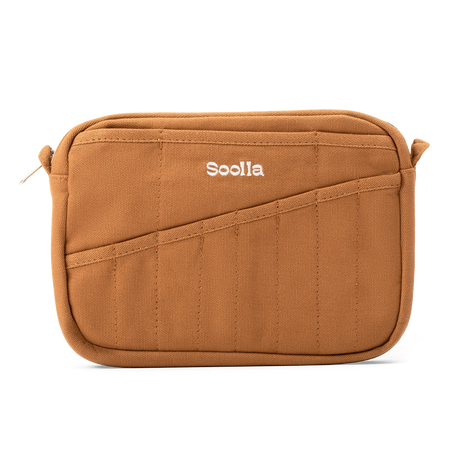 Features &amp; Specs

Front layout: 8 slanted pockets + 3 directly behind
Interior: Main compartment fits an A5 notebook; two open compartments on each wall
Back panel: 3 wide exterior pockets + one full-length slip pocket&nbsp;
Quick-drying duck canvas — sturdy, breathable, and machine-washable
Convertible design — hooks for your own strap or a Soolla strap (coming soon)&nbsp;
Structured silhouette — holds its shape even when lightly packed
Full-width YKK zipper — smooth and durable
Compact profile — fits 