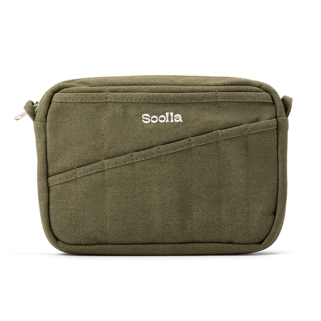 Features &amp; Specs

Front layout: 8 slanted pockets + 3 directly behind
Interior: Main compartment fits an A5 notebook; two open compartments on each wall
Back panel: 3 wide exterior pockets + one full-length slip pocket&nbsp;
Quick-drying duck canvas — sturdy, breathable, and machine-washable
Convertible design — hooks for your own strap or a Soolla strap (coming soon)&nbsp;
Structured silhouette — holds its shape even when lightly packed
Full-width YKK zipper — smooth and durable
Compact profile — fits 