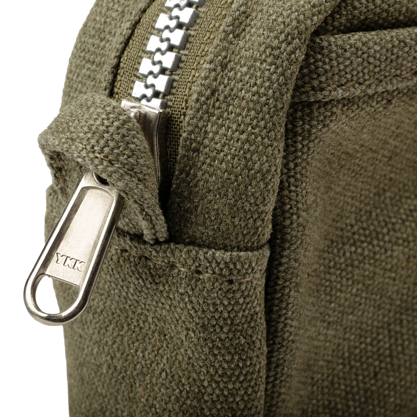 Features &amp; Specs

Front layout: 8 slanted pockets + 3 directly behind
Interior: Main compartment fits an A5 notebook; two open compartments on each wall
Back panel: 3 wide exterior pockets + one full-length slip pocket&nbsp;
Quick-drying duck canvas — sturdy, breathable, and machine-washable
Convertible design — hooks for your own strap or a Soolla strap (coming soon)&nbsp;
Structured silhouette — holds its shape even when lightly packed
Full-width YKK zipper — smooth and durable
Compact profile — fits 