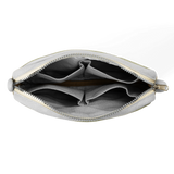 Features &amp; Specs

Front layout: 8 slanted pockets + 3 directly behind
Interior: Main compartment fits an A5 notebook; two open compartments on each wall
Back panel: 3 wide exterior pockets + one full-length slip pocket&nbsp;
Quick-drying duck canvas — sturdy, breathable, and machine-washable
Convertible design — hooks for your own strap or a Soolla strap (coming soon)&nbsp;
Structured silhouette — holds its shape even when lightly packed
Full-width YKK zipper — smooth and durable
Compact profile — fits 