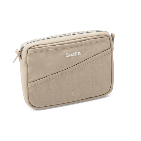 Features &amp; Specs

Front layout: 8 slanted pockets + 3 directly behind
Interior: Main compartment fits an A5 notebook; two open compartments on each wall
Back panel: 3 wide exterior pockets + one full-length slip pocket&nbsp;
Quick-drying duck canvas — sturdy, breathable, and machine-washable
Convertible design — hooks for your own strap or a Soolla strap (coming soon)&nbsp;
Structured silhouette — holds its shape even when lightly packed
Full-width YKK zipper — smooth and durable
Compact profile — fits 