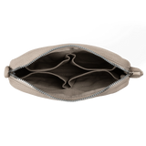 Features &amp; Specs

Front layout: 8 slanted pockets + 3 directly behind
Interior: Main compartment fits an A5 notebook; two open compartments on each wall
Back panel: 3 wide exterior pockets + one full-length slip pocket&nbsp;
Quick-drying duck canvas — sturdy, breathable, and machine-washable
Convertible design — hooks for your own strap or a Soolla strap (coming soon)&nbsp;
Structured silhouette — holds its shape even when lightly packed
Full-width YKK zipper — smooth and durable
Compact profile — fits 