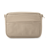 Features &amp; Specs

Front layout: 8 slanted pockets + 3 directly behind
Interior: Main compartment fits an A5 notebook; two open compartments on each wall
Back panel: 3 wide exterior pockets + one full-length slip pocket&nbsp;
Quick-drying duck canvas — sturdy, breathable, and machine-washable
Convertible design — hooks for your own strap or a Soolla strap (coming soon)&nbsp;
Structured silhouette — holds its shape even when lightly packed
Full-width YKK zipper — smooth and durable
Compact profile — fits 