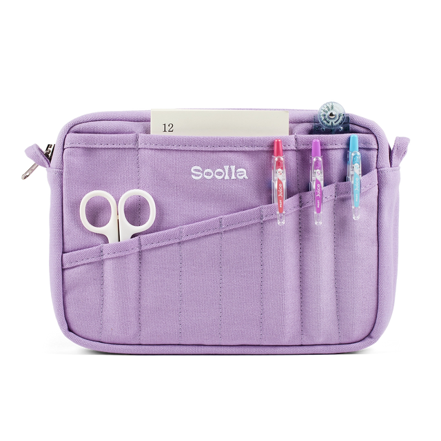 A compact carry-all pouch for artists, makers, and stationary lovers who appreciate a little order in their chaos. Structured enough to hold its form, soft enough to fit anywhere, and fully machine-washable for the days that get a little messy — your tools, pens, and creative essentials stay safe, visible, and ready wherever you go.

Inside, 20 pockets make space for art supplies, stationary essentials, and an A5 notebook, all secured by a smooth YKK zipper. Sized to fit within larger bags or carry on its o