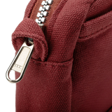 Front layout: 8 slanted pockets + 3 directly behind
Interior: Main compartment fits an A5 notebook; two open compartments on each wall
Back panel: 3 wide exterior pockets + one full-length slip pocket&nbsp;
Quick-drying duck canvas — sturdy, breathable, and machine-washable
Convertible design — hooks for your own strap or a Soolla strap (coming soon)&nbsp;
Structured silhouette — holds its shape even when lightly packed
Full-width YKK zipper — smooth and durable
Compact profile — fits inside larger bags or 