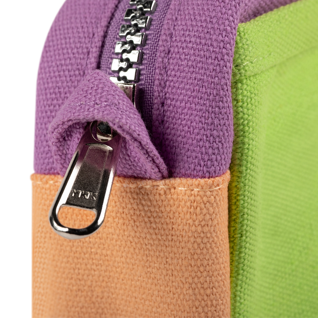 A compact carry-all pouch for artists, makers, and stationary lovers who appreciate a little order in their chaos. Structured enough to hold its form, soft enough to fit anywhere, and fully machine-washable for the days that get a little messy — your tools, pens, and creative essentials stay safe, visible, and ready wherever you go.

Inside, 20 pockets make space for art supplies, stationary essentials, and an A5 notebook, all secured by a smooth YKK zipper. Sized to fit within larger bags or carry on its o