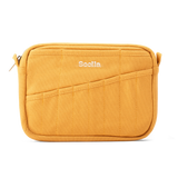 Features &amp; Specs

Front layout: 8 slanted pockets + 3 directly behind
Interior: Main compartment fits an A5 notebook; two open compartments on each wall
Back panel: 3 wide exterior pockets + one full-length slip pocket&nbsp;
Quick-drying duck canvas — sturdy, breathable, and machine-washable
Convertible design — hooks for your own strap or a Soolla strap (coming soon)&nbsp;
Structured silhouette — holds its shape even when lightly packed
Full-width YKK zipper — smooth and durable
Compact profile — fits 