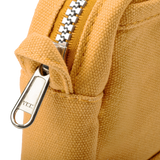 Features &amp; Specs

Front layout: 8 slanted pockets + 3 directly behind
Interior: Main compartment fits an A5 notebook; two open compartments on each wall
Back panel: 3 wide exterior pockets + one full-length slip pocket&nbsp;
Quick-drying duck canvas — sturdy, breathable, and machine-washable
Convertible design — hooks for your own strap or a Soolla strap (coming soon)&nbsp;
Structured silhouette — holds its shape even when lightly packed
Full-width YKK zipper — smooth and durable
Compact profile — fits 