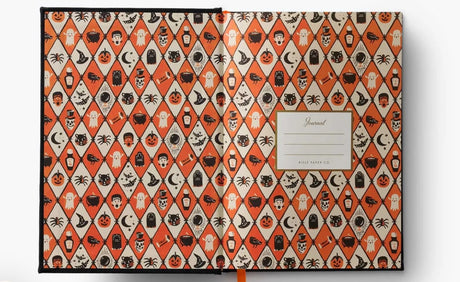 With Halloween embroidery on a corduroy cover, this journal features 400 lined pages and a grosgrain ribbon bookmark to save your place