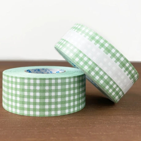 Stamp Marche Gingham Label Sticker Roll - Dusty Green

Label stickers with Stamp Marche original designs.&nbsp;These are stickers originally for price tag applicators,now featuring a gingham check pattern!&nbsp;They can also be used to seal letters and envelopes, or as decorative materials for your planner. Fold them in half to use as index stickers or write or stamp them. Each pack contains 1,000 stickers with the same design, making them ideal for daily use or sharing.

Product Size: Approx. 55 x 21.6 mm 