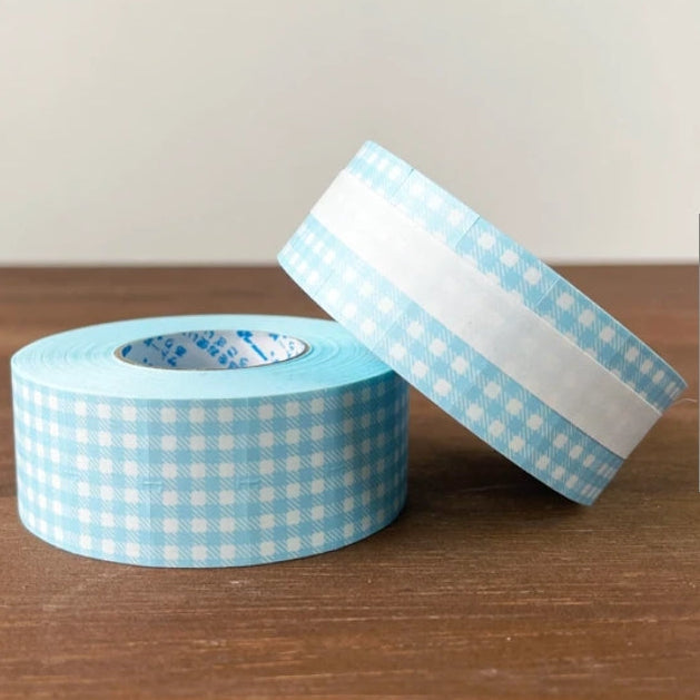 Label stickers with Stamp Marche original designs.&nbsp;These are stickers originally for price tag applicators,now featuring a gingham check pattern!&nbsp;They can also be used to seal letters and envelopes, or as decorative materials for your planner. Fold them in half to use as index stickers or write or stamp them. Each pack contains 1,000 stickers with the same design, making them ideal for daily use or sharing.

Product Size: Approx. 55 x 21.6 mm in diameter.
Sticker Size (Single Piece): Approx. 12.0 