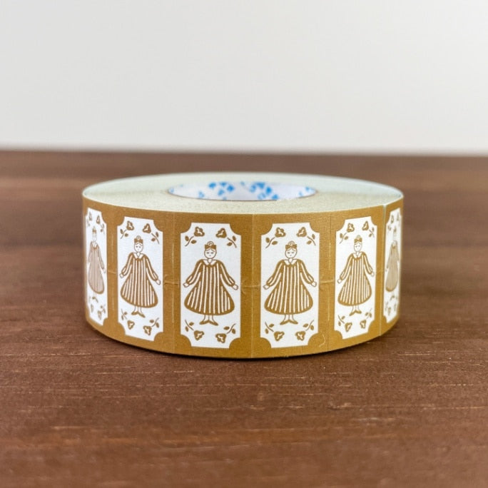 Stamp Marche Label Sticker Roll - Maru-chan Retro Brown Roll of decorative tape with printed design on a wooden surface
