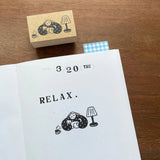 Bring a touch of charm to your journaling with this adorable Marl‑chan wooden stamp from Stamp Marche. Featuring the brand’s signature sign girl, this illustration stamp adds personality and warmth to planners, letters, scrapbooks, and creative projects.


Each stamp is crafted with a solid wooden mount and high‑quality rubber, giving you crisp, clean impressions every time. Whether you’re decorating daily spreads or adding a cute accent to handmade cards, Marl‑chan brings a delightful, whimsical feel to yo