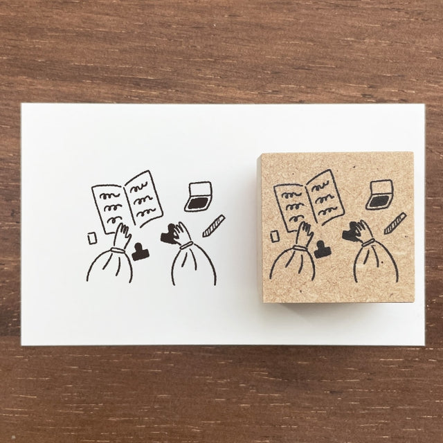 
Bring a touch of charm to your journaling with this adorable Marl‑chan wooden stamp from Stamp Marche. Featuring the brand’s signature sign girl, this illustration stamp adds personality and warmth to planners, letters, scrapbooks, and creative projects.

Each stamp is crafted with a solid wooden mount and high‑quality rubber, giving you crisp, clean impressions every time. Whether you’re decorating daily spreads or adding a cute accent to handmade cards, Marl‑chan brings a delightful, whimsical feel to yo
