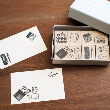 Step into a world of everyday charm with the Creator’s Stamp Box – Inside the Bag, a delightful collaboration between Stamp Marche and Sonomi Kogei. This curated set captures the little treasures we carry with us—perfect for adding personality and storytelling to your journal pages, planners, scrapbooks, and creative projects.


Each stamp is crafted with a solid wooden mount and high‑quality rubber, giving you crisp, clean impressions every time.&nbsp;



This set includes 8 stamps.

Stamp size: approx.&nb