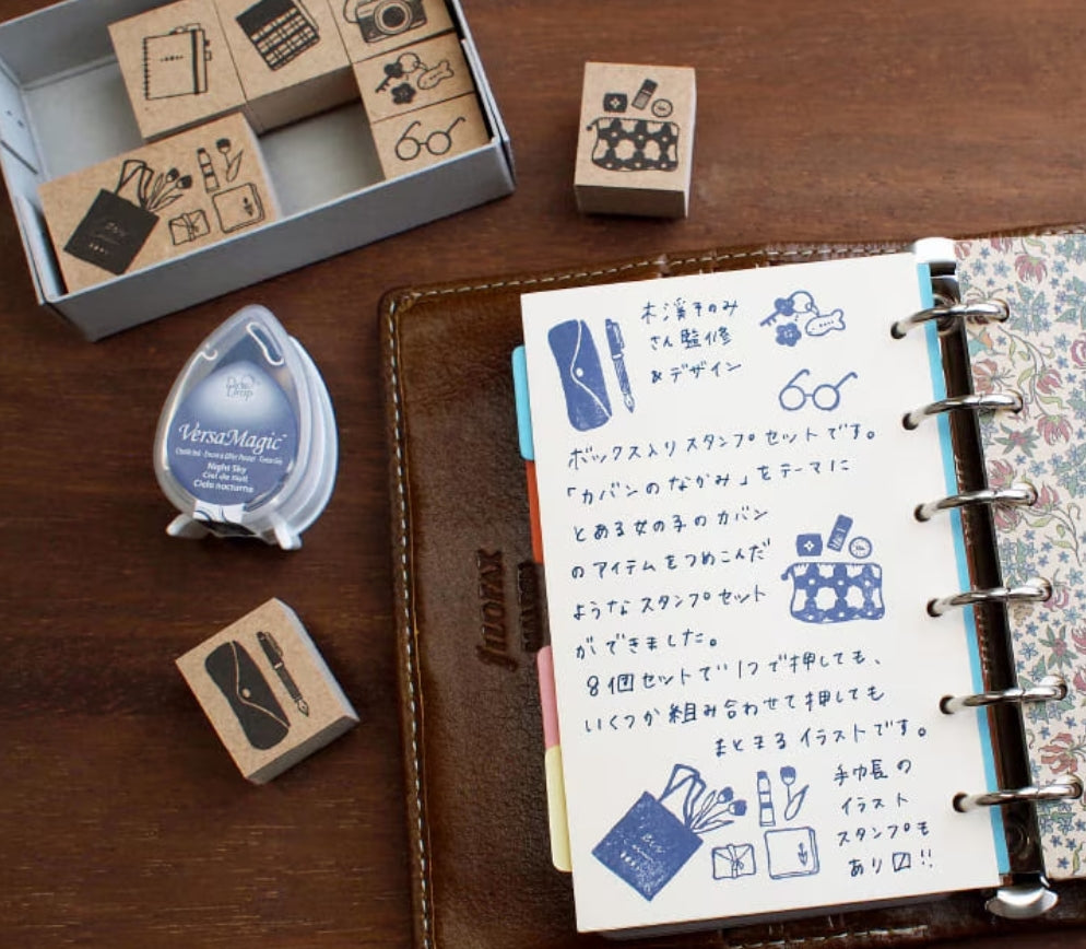 Step into a world of everyday charm with the Creator’s Stamp Box – Inside the Bag, a delightful collaboration between Stamp Marche and Sonomi Kogei. This curated set captures the little treasures we carry with us—perfect for adding personality and storytelling to your journal pages, planners, scrapbooks, and creative projects.


Each stamp is crafted with a solid wooden mount and high‑quality rubber, giving you crisp, clean impressions every time.&nbsp;



This set includes 8 stamps.

Stamp size: approx.&nb