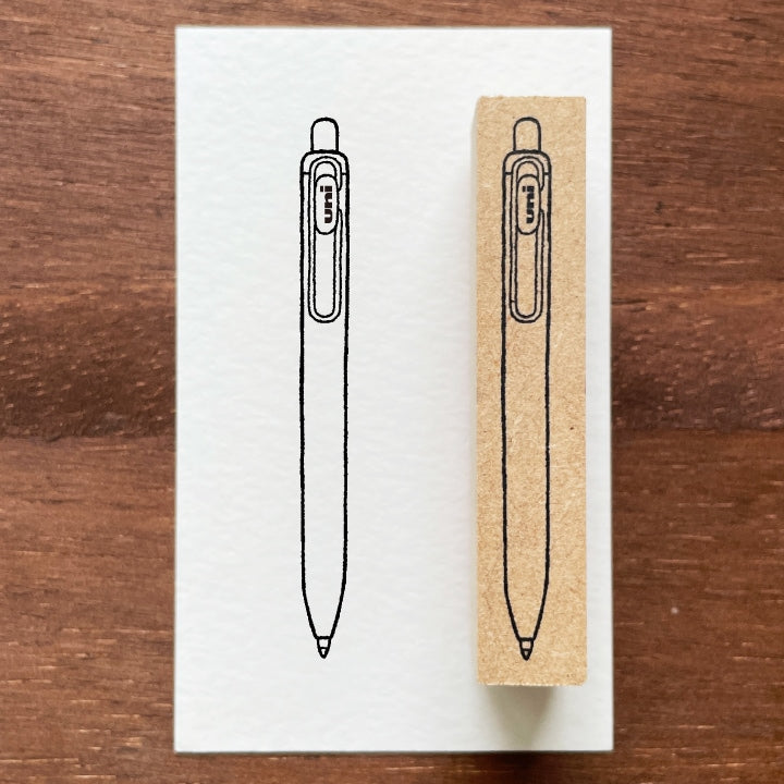 Stamp Marche Uni-ball One Wooden Stamp Rubber stamp with a pen design on a wooden surface