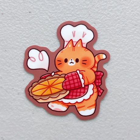 StickyRiceCo - Baking Pumpkin Pie Orange Cat Vinyl Sticker

Leftovers from our 28th birthday event! These heavy duty waterproof vinyl stickers are perfect for decorating any laptop, water bottle, iPad case, notebook cover, etc!

Details:

Heavy duty vinyl
Waterproof
Dimensions of sticker: approx &nbsp;2.4 x 2.7 in