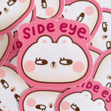 Rice the Bear gives you side eye... This heavy duty waterproof vinyl sticker is perfect for decorating any laptop, water bottle, iPad case, notebook cover, etc!

Details:

Heavy duty vinyl
Waterproof
Dimensions of sticker: approx 2.6 in x 2.4 in&nbsp;