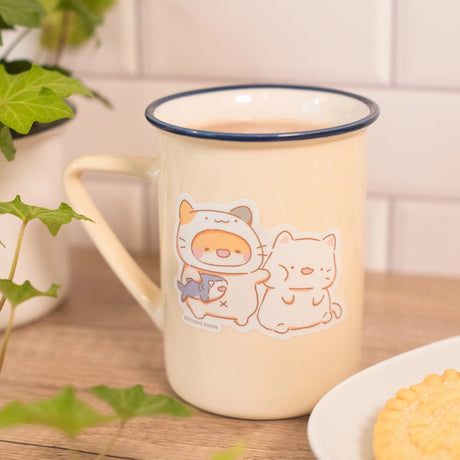 Muffinmaru discovered the perfect way to enhance his bond his cat friend—becoming a cat. The matte coating on this sticker gives it a premium soft touch and the backing paper is cut for an easy peeling experience.

Dimensions:&nbsp; 2.7” x 1.9” (6.8cm x 4.9cm)
Material: PP
Waterproof
Quantity: 1 sticker