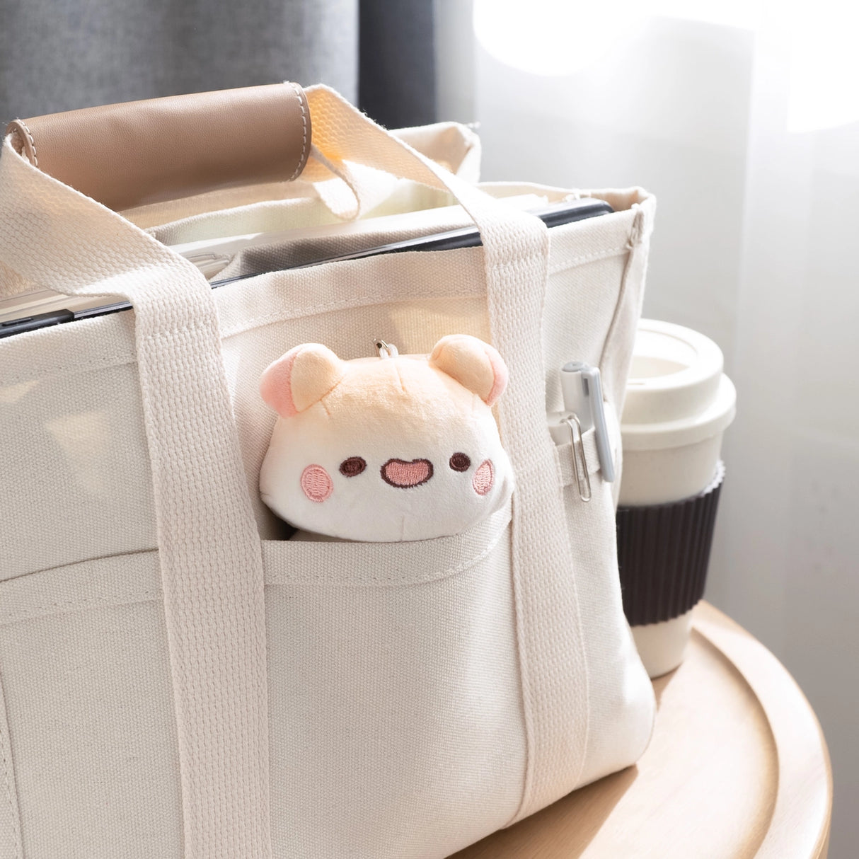 A cute Muffinmaru plush Keychain made of soft and premium materials. Comes with a detachable chain so you can bring this mini Muffinmaru will on many foodie adventures with you.

Approximate Dimensions: plush part 4.5" tall (11cm)
Hand wash only and do not tumble dry, dry clean or iron