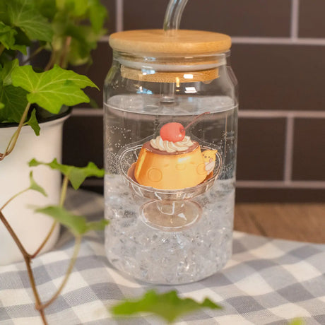 A premium clear sticker of Devyegg serving up a large Muffinmaru pudding. Devyegg is here to bring an extra serving of pudding and sweetness into your life with this delightful sticker. Clear stickers give off a refreshing look and are particularly striking on translucent surfaces. Comes with a removable white paper backing.

Approximate Dimensions: 2.4” x 2.5” (6.1cm x 6.4cm)
Material: Clear PET
Waterproof
Quantity: 1 sticker